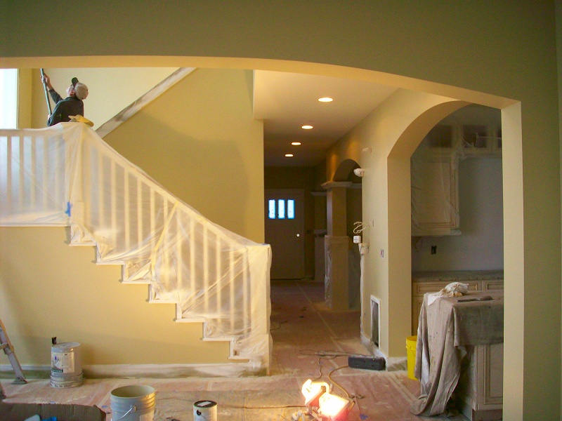 interior painting prep by Superior Painting, drop cloths down